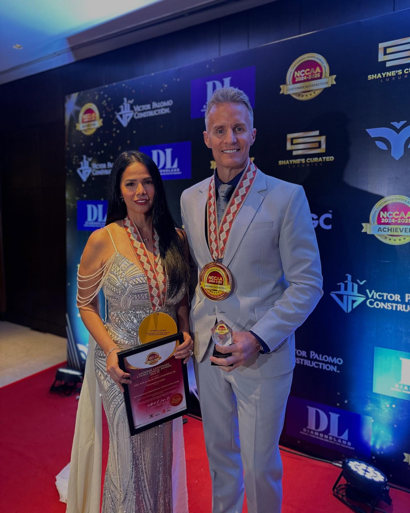 Doc Rob Vitality founders receiving customer satisfaction awards
