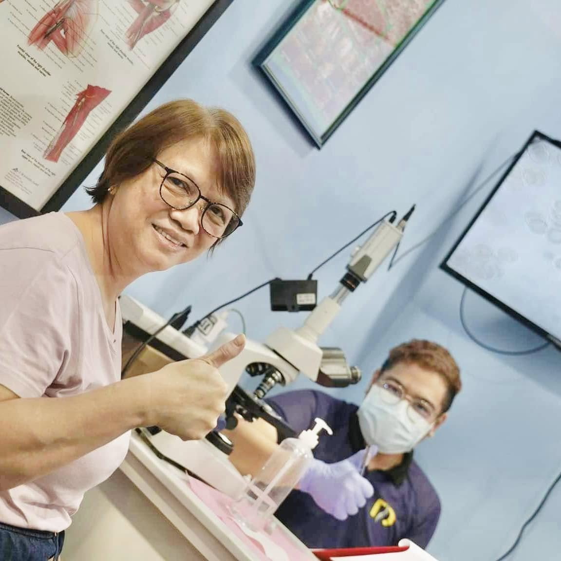 Patient with a clinician at Doc Rob Vitality Wellness Center